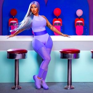 NWT Lavender Reebok bodysuit. Cardi B collection